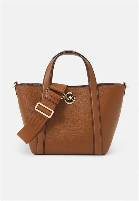 michael michael kors bolso saco|Michael Kors clothing.